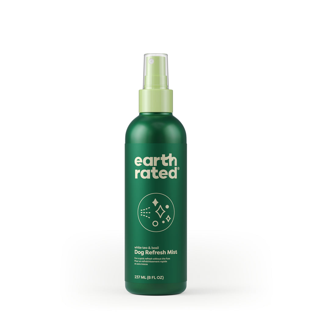 Green bottle of Earth Rated dog refresh mist on a white background