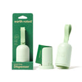 Green pet poop bag dispenser with packaging on a white background